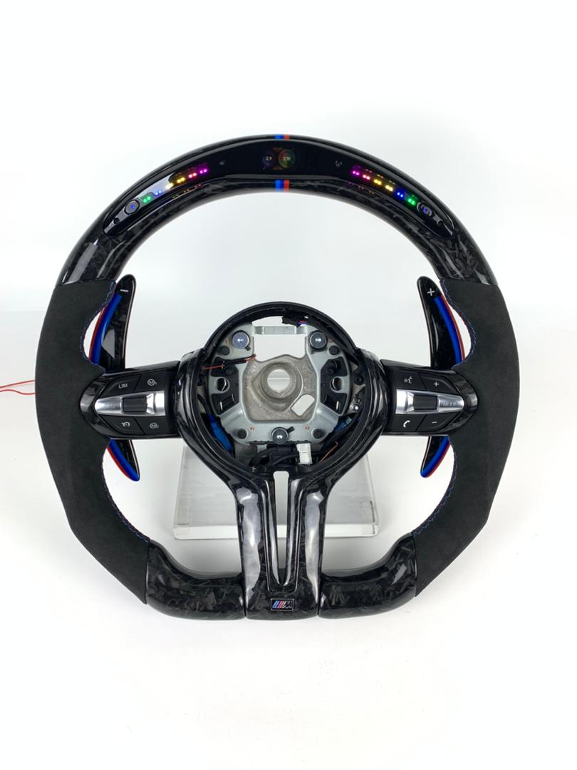 BMW F Series Forged Carbon & Alcantara with Forged Carbon Paddles, Colour LED Display, BMW Tri Colour Stitching & Accents
