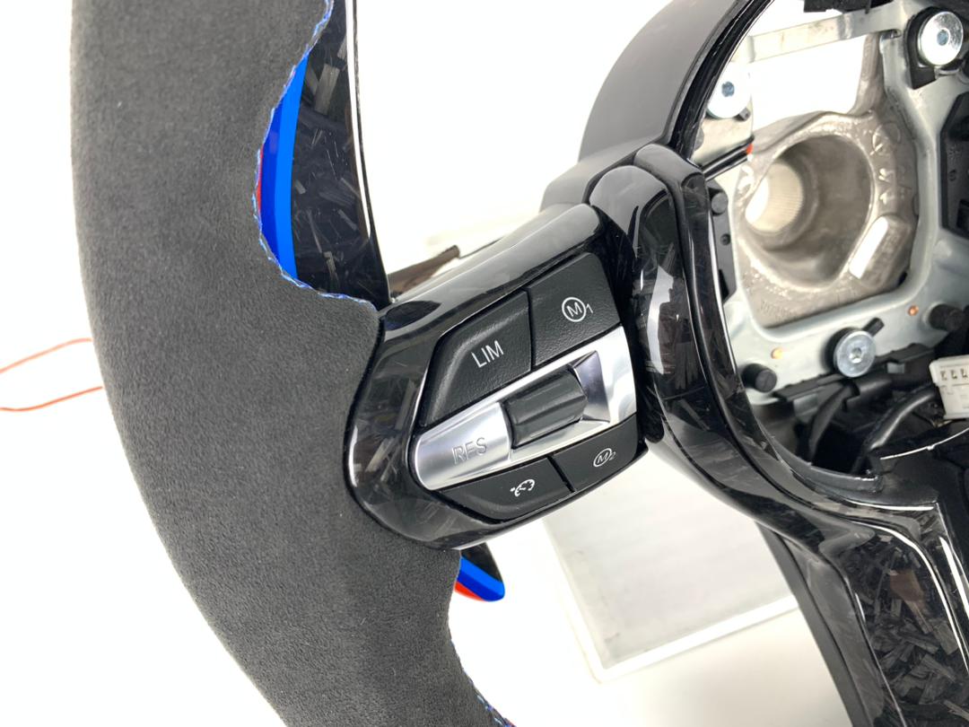 BMW F Series Forged Carbon & Alcantara with Forged Carbon Paddles, Colour LED Display, BMW Tri Colour Stitching & Accents