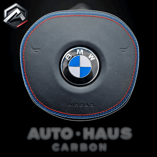 BMW G Series Black Leather with BMW Tri Stitch Airbag Cover